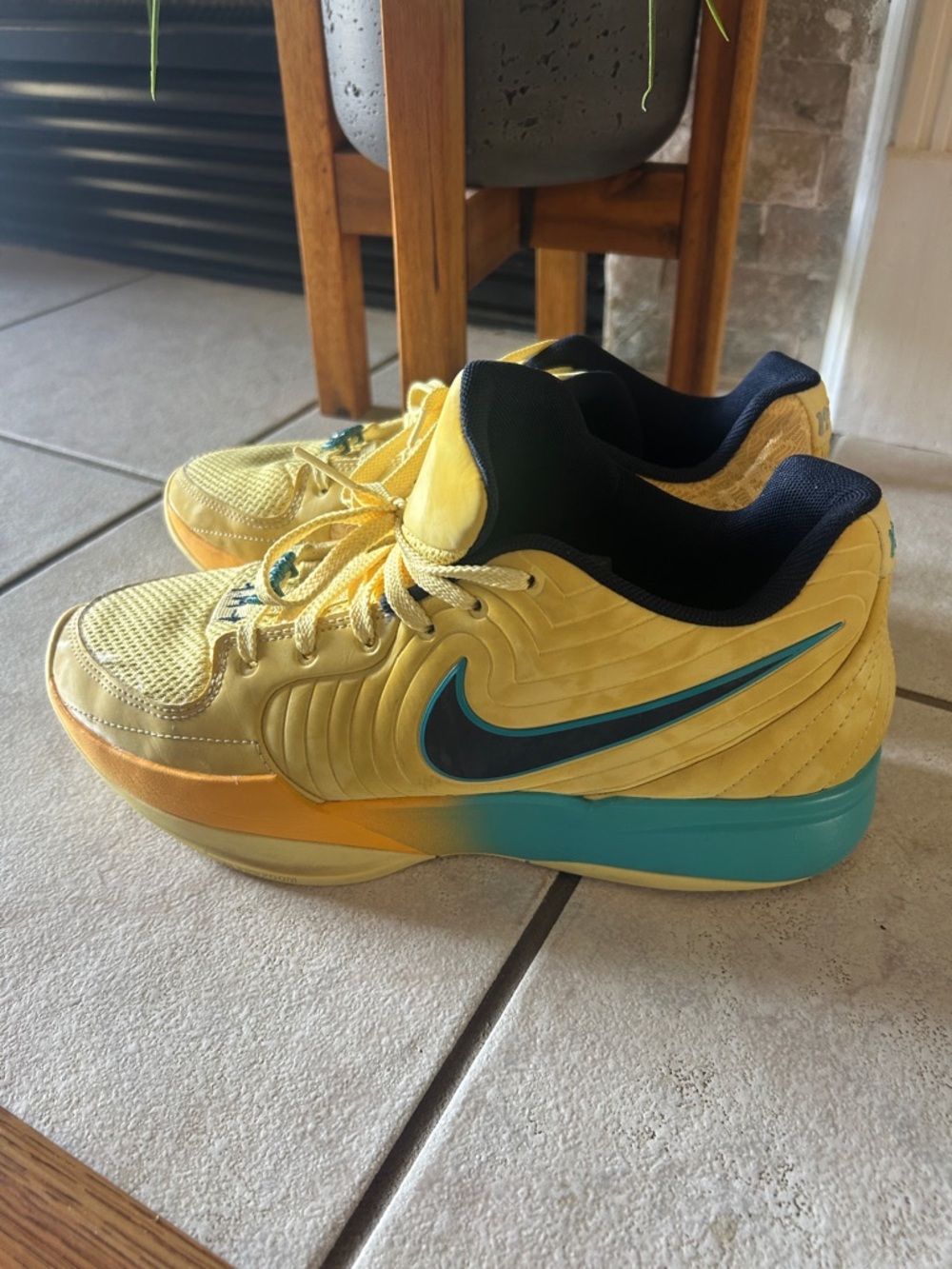 Nike Men's Yellow Sneakers with Teal and Black Accents